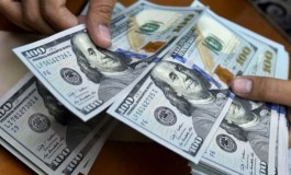 Dólar cai a R$ 3,74 à espera de definições em Brasília